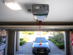 Automatic garage motor installed on a garage door